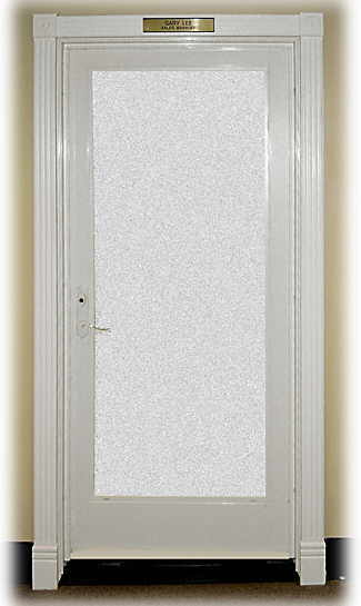 Door trimmed with 3-in-1, stop-fluted molding